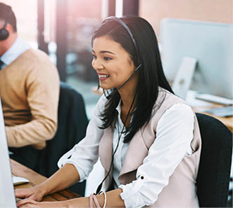Cropped shot of an attractive young female operator working at her desk