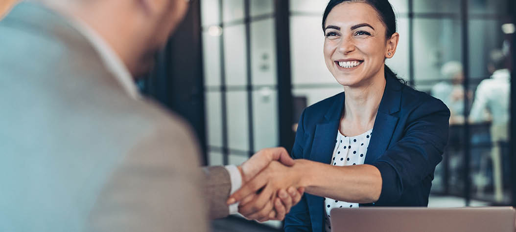 Business persons talking in the office